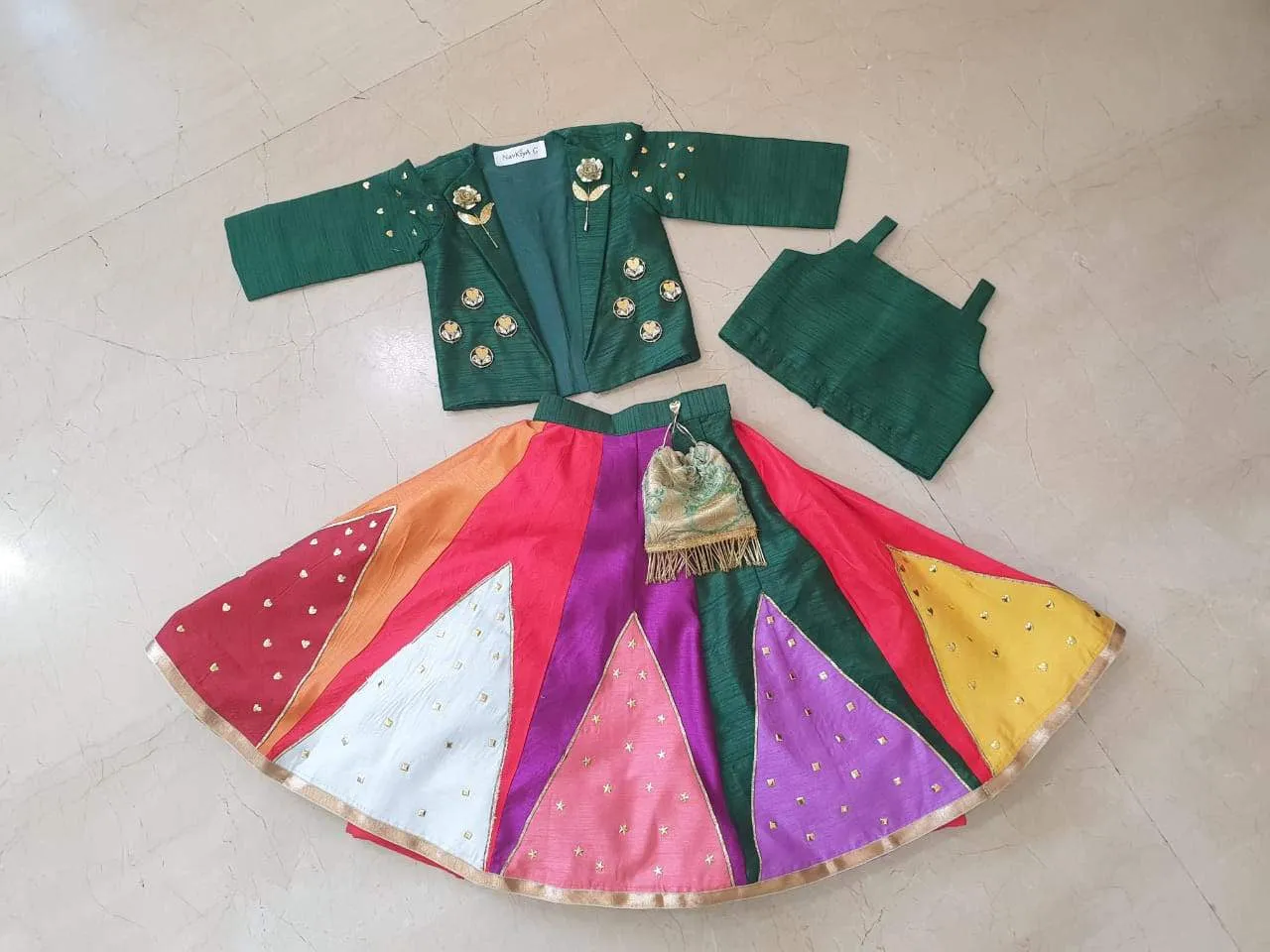 Bottle green crop coat with multi color lehenga