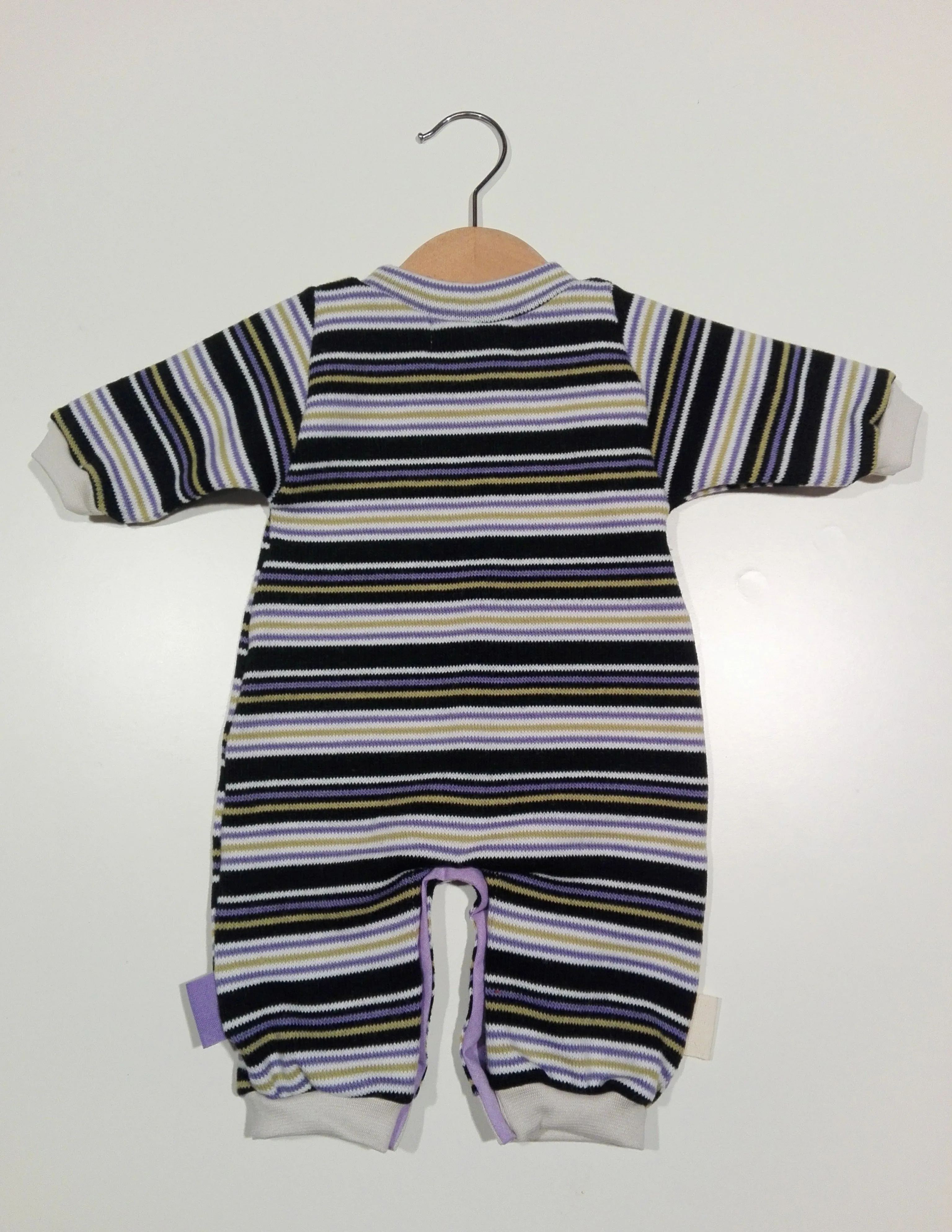 Onesie in wool with cuffs in cotton