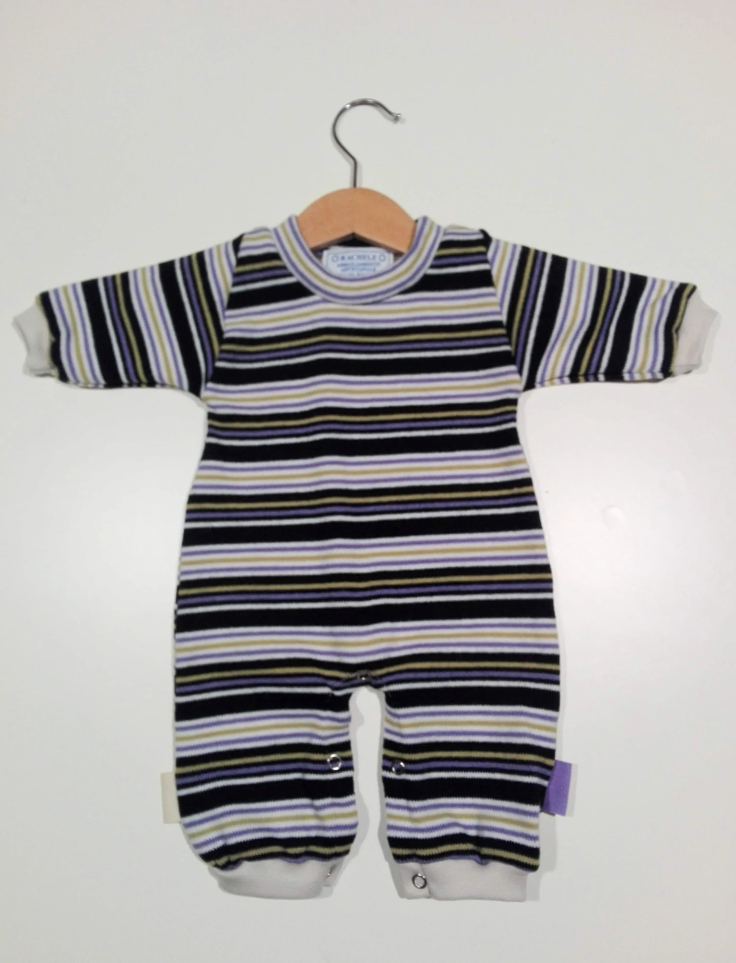 Onesie in wool with cuffs in cotton