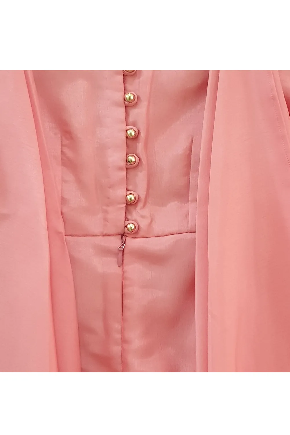 Peachy pink jumpsuit with front layers and sequined belt