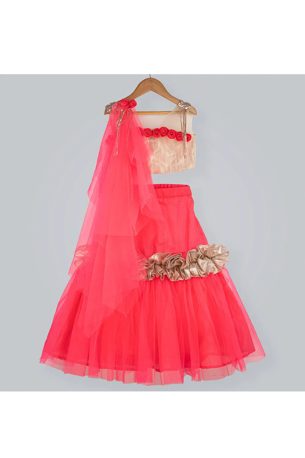 Pink and golden choli and ghaghra with frill and dupatta