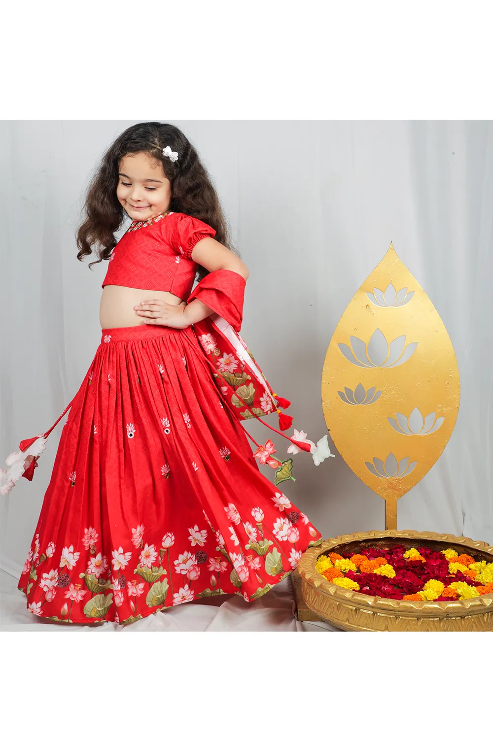 Red embroidered choli and lotus printed lehenga with dupatta