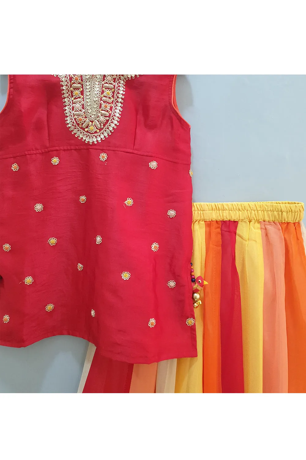 Red embroidered kurti and colorful sharara