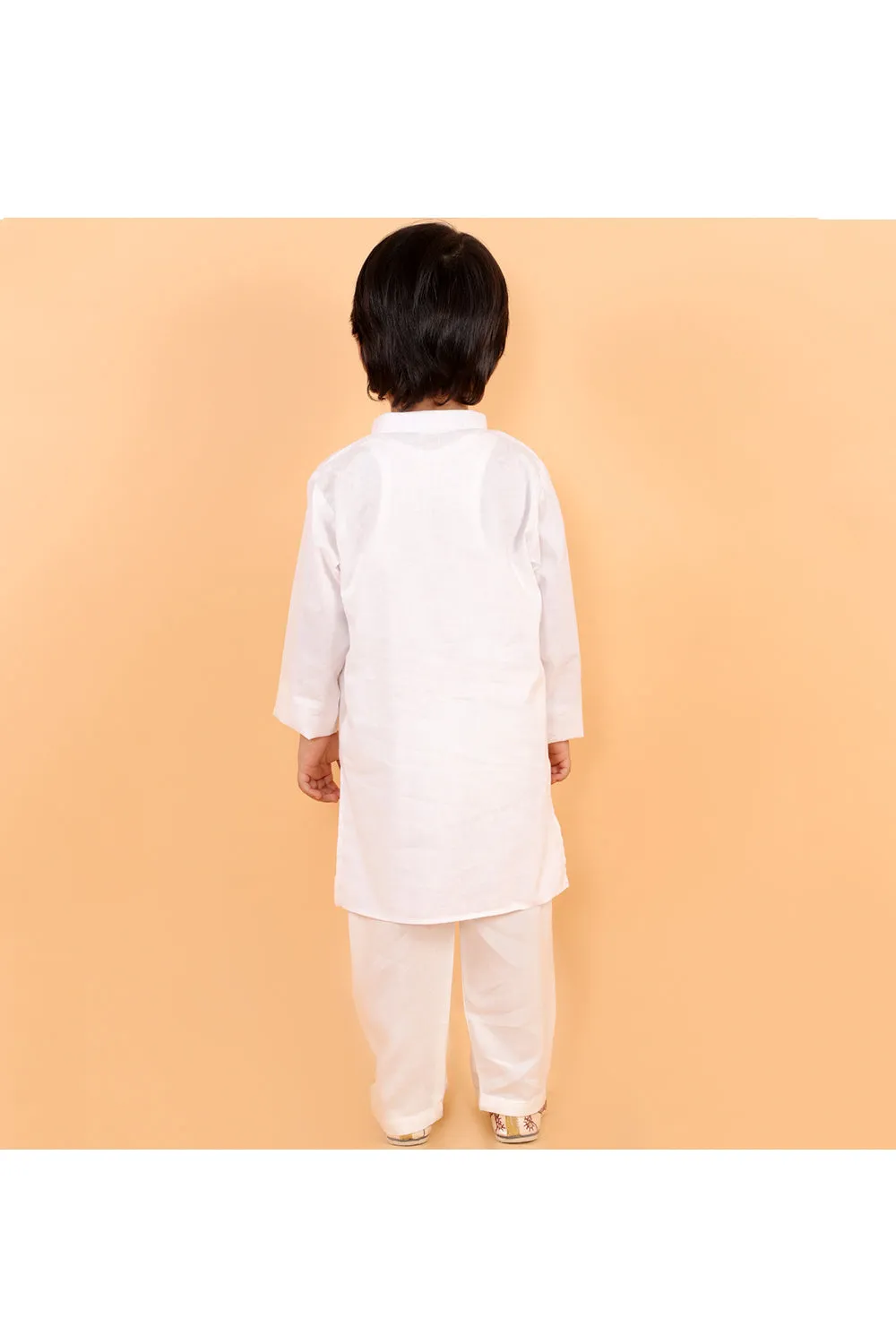 White holi kurta with colorful patches and gota and white pyjama