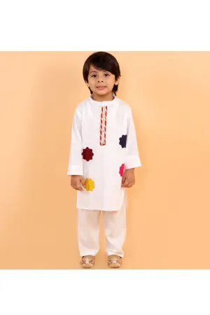 White holi kurta with colorful patches and gota and white pyjama