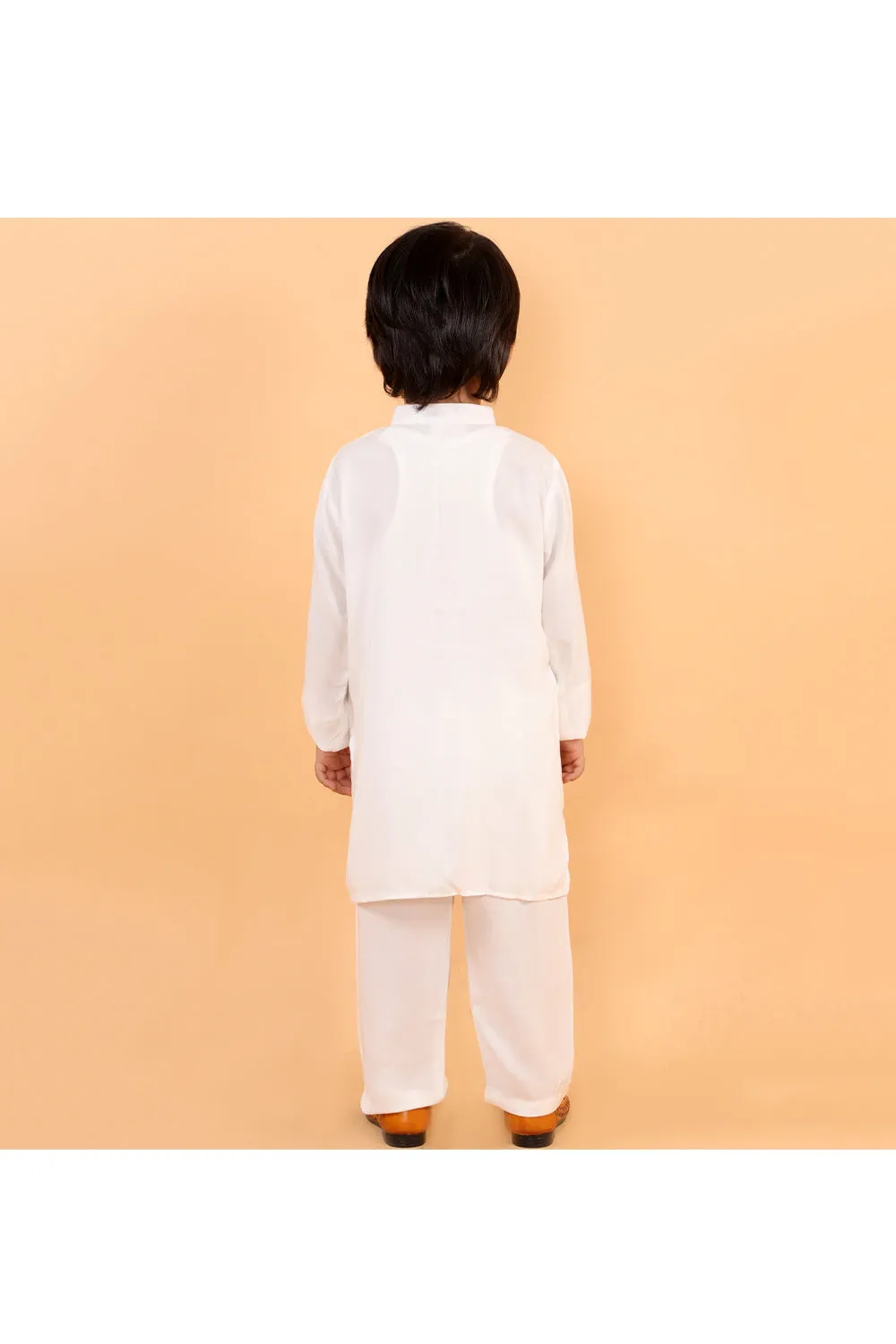 White holi kurta with colorful patches and white pyjama