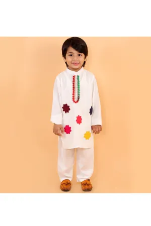 White holi kurta with colorful patches and white pyjama