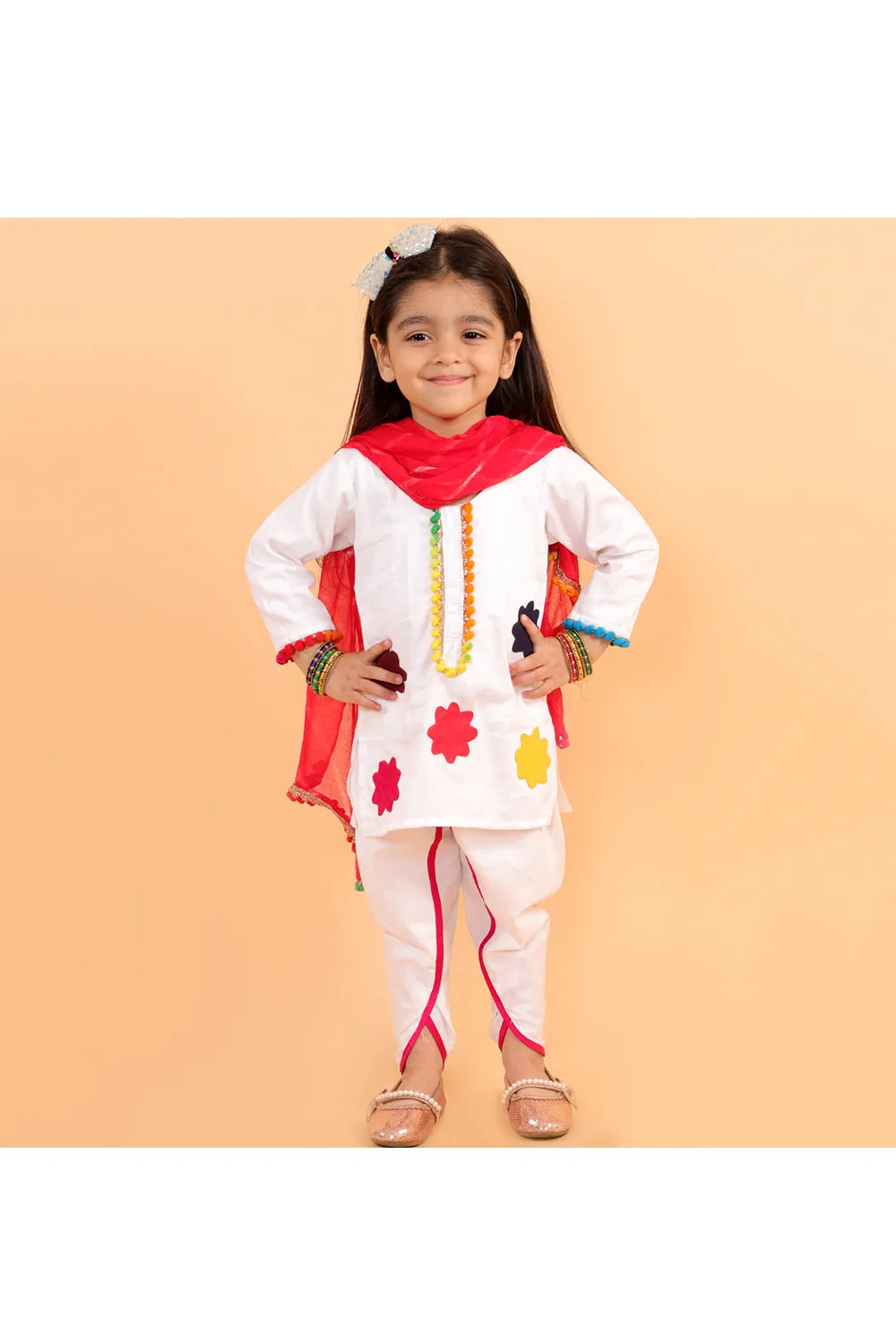 White kurta with colorful patches and dhoti with colorful dupatta