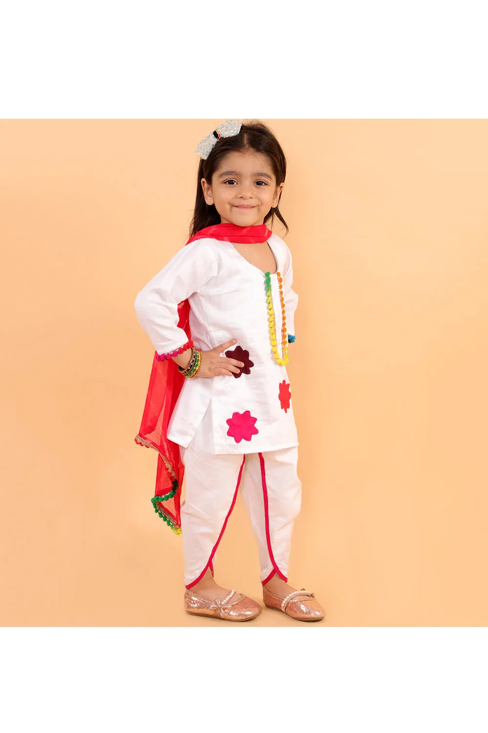 White kurta with colorful patches and dhoti with colorful dupatta